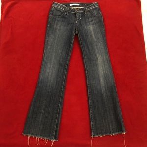 Blue Boot Cut Jeans with Distressed Hem and Vintage Fade